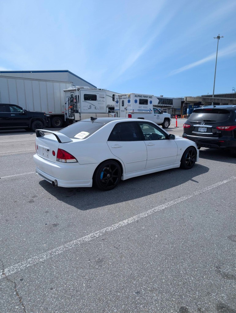 White Toyota Altezza at Vancouver ferry terminal ready for pickup