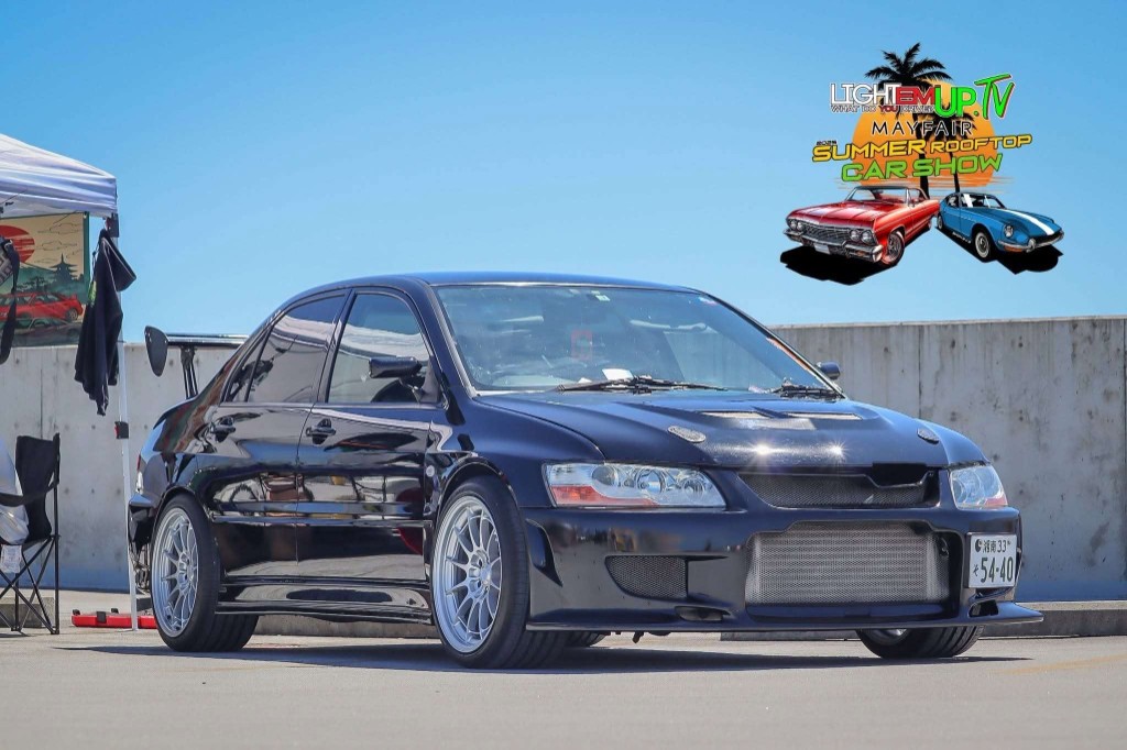 Mitsubishi Lancer Evolution VII at a car show imported by Beyond Limits Imports
