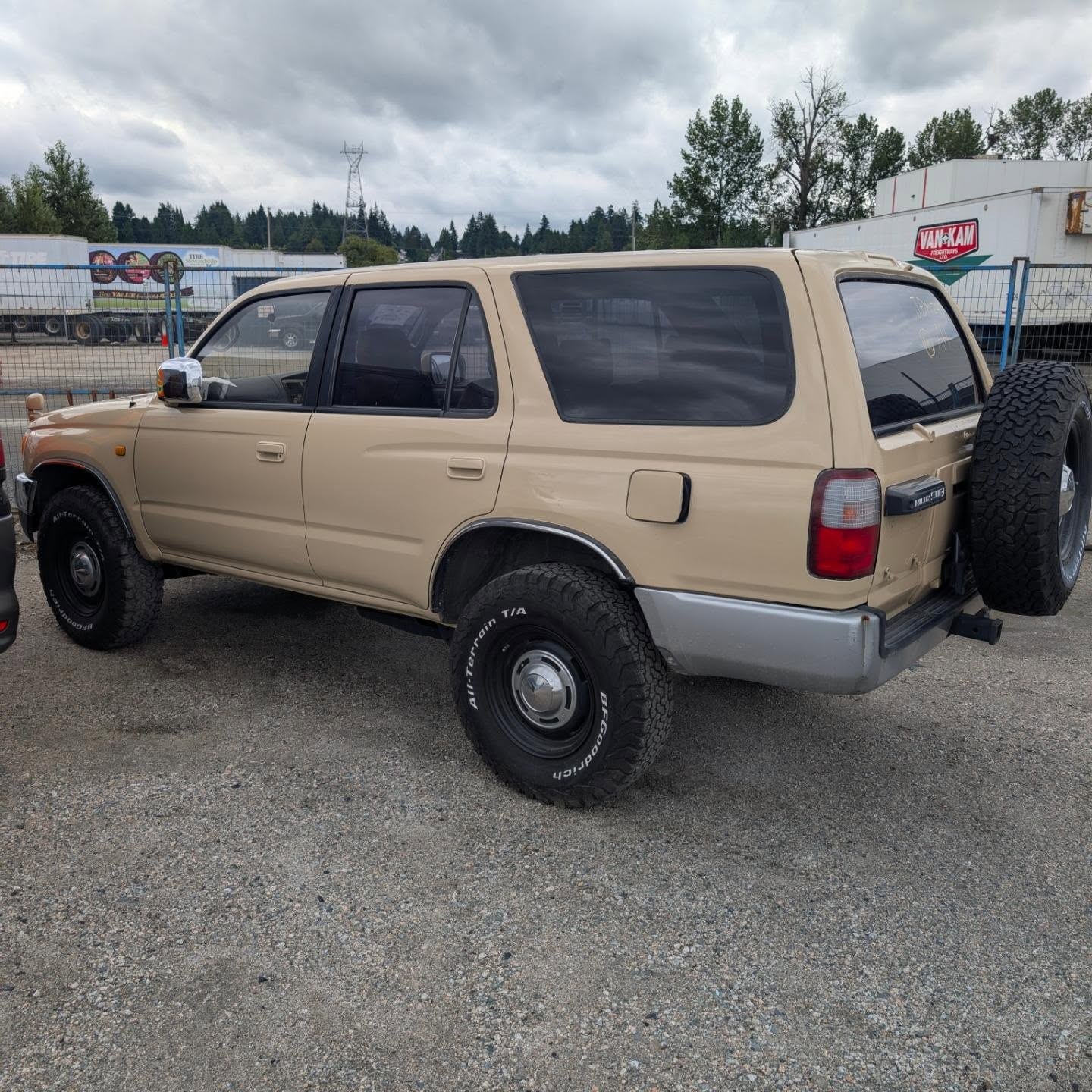 Tan Toyota Hilux Surf parked at the Vancouver port lot after clearing Canadian customs