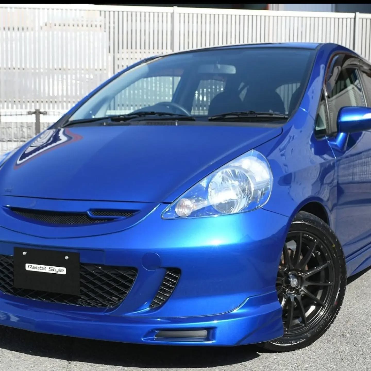 Metallic blue Honda Fit JDM hatchback imported in July